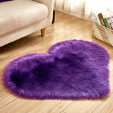 Plush home heart-shaped rug by the bedroom bed